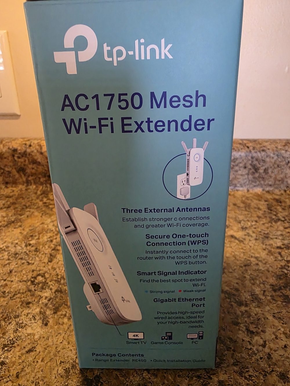TP-Link AC1750 Mesh Wi-Fi Extender in teal and white